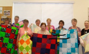 A picture of the ladies who are part of the legacy quilters.
